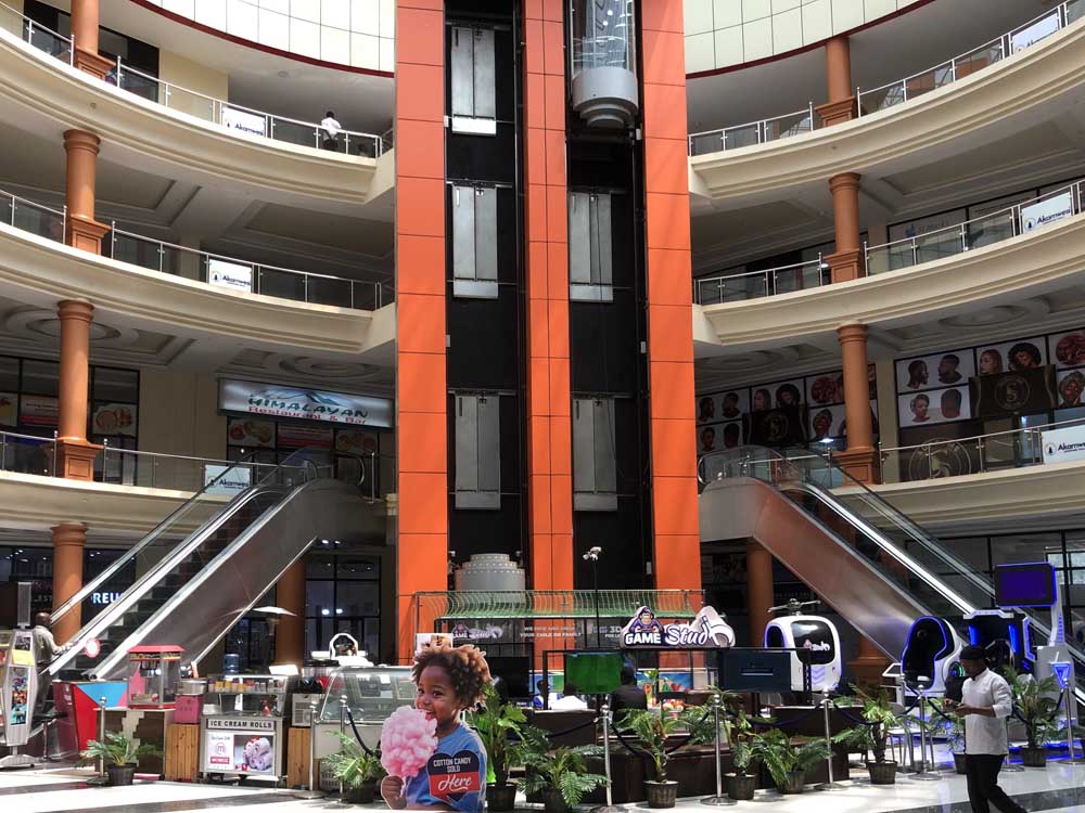 Akamwesi Shopping Mall Uganda. Location Kyebando, Kampala Uganda. Services: Space to Let/Rent, Offices, Super Market, Fashion Shops/Clothes Stores, Bars and Restaurants, ATMs, Bridal/Wedding Gardens (Akamwesi Gardens), Kids Play Park-Lloli Fun Park, Soccer Turf/Soccer Pitch, Swimming Pool, Sauna and Steam Bath, Gym, Beauty Salons, Electronics And Phone Stores, Furniture Stores, Car Washing Bays. Location: Kyebando, Gayaza Road, Akamwesi Mall Kampala Uganda. furnitureug.com